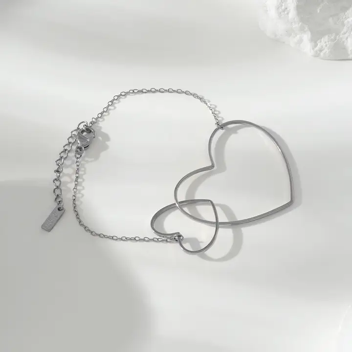 Bracelet cœurs croisés argentées 2
