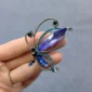 Broche verre et strass papillon