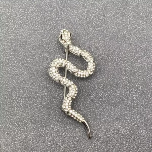 Broche serpent strass