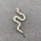 Broche serpent strass