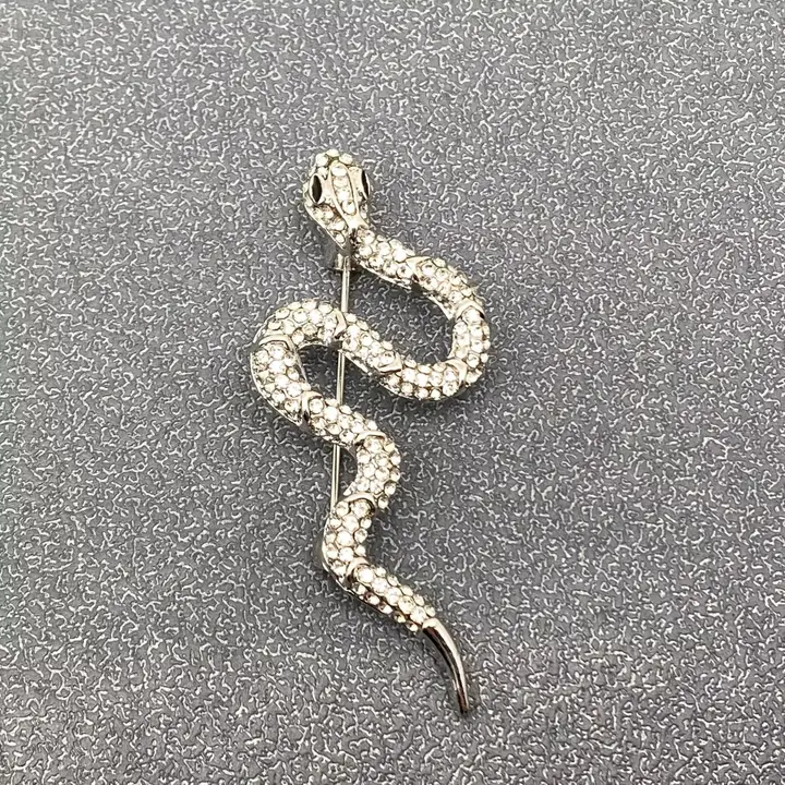 Broche serpent strass
