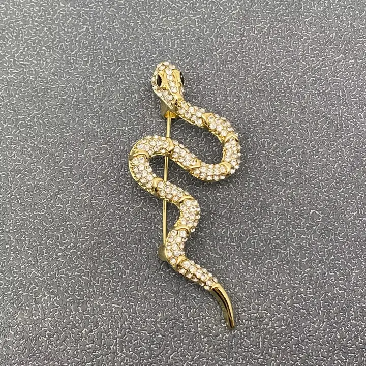Broche serpent strass
