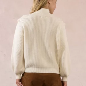 Pull au buste fantaisie