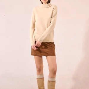 Pull col roulé boutonné