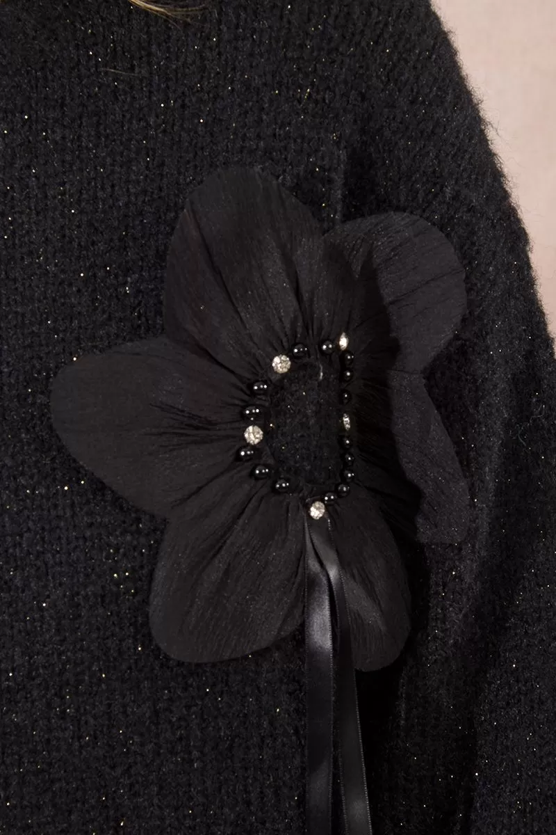 Pull fleurs en relief